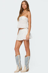 Dora Eyelet Flared Mini Skirt